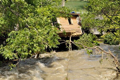 Chaos: looking upstream along the Leri after the flood's peak, June 9th 2012